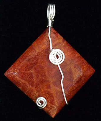 Resin coated Bali red coral pendant - Indonesia